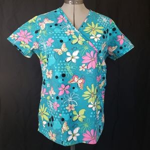 Floral Scrub and Tan Pants